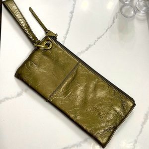 Hobo leather wristlet in metallic olive/gold